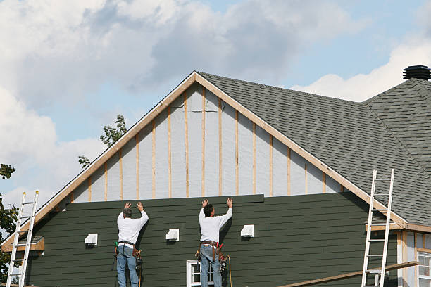 Professional Siding Replacement technician working in Ridgeway, VA